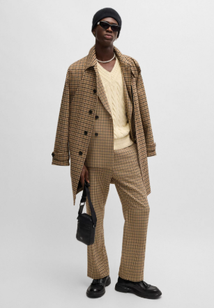 Houndstooth-check coat with concealed closure